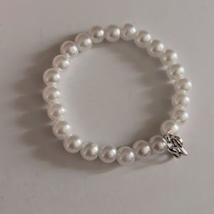 Pearl beaded bracelet with infinity heart charm